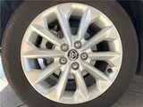 2025 Toyota Corolla Hybrid G Pearl Sedan for sale, Japanese used car export - photo 20 of 30 | GULJI TRADERS