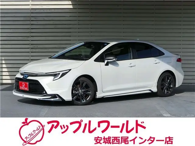 2025 Toyota Corolla Hybrid Double WBY Modellista Aero Genuine DA Navi Full Seg TV Pearl Sedan for sale, Japanese used car export | GULJI TRADERS