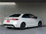 2025 Toyota Corolla Hybrid Double WBY Modellista Aero Genuine DA Navi Full Seg TV Pearl Sedan for sale, Japanese used car export - photo 2 of 38 | GULJI TRADERS