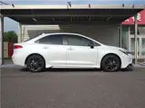 2025 Toyota Corolla Hybrid Double WBY Modellista Aero Genuine DA Navi Full Seg TV Pearl Sedan for sale, Japanese used car export - photo 14 of 38 | GULJI TRADERS