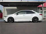 2025 Toyota Corolla Hybrid Double WBY Modellista Aero Genuine DA Navi Full Seg TV Pearl Sedan for sale, Japanese used car export - photo 15 of 38 | GULJI TRADERS