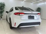 2025 Toyota Corolla Hybrid Double By Pearl Sedan for sale, Japanese used car export - photo 4 of 48 | GULJI TRADERS