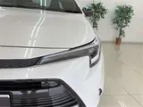 2025 Toyota Corolla Hybrid Double By Pearl Sedan for sale, Japanese used car export - photo 21 of 48 | GULJI TRADERS