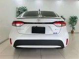 2025 Toyota Corolla Hybrid Double By Pearl Sedan for sale, Japanese used car export - photo 34 of 48 | GULJI TRADERS