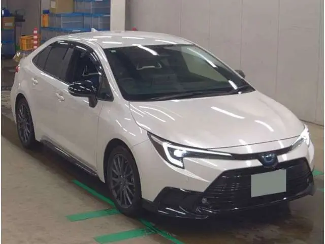 2025 Toyota Corolla Active sports - photo 1 2025 Toyota Corolla Active sports Pearl Sedan for sale, Japanese used car export - photo 1 of 10 | GULJI TRADERS
