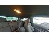 2025 Toyota Corolla Active sports Pearl Sedan for sale, Japanese used car export - photo 9 of 10 | GULJI TRADERS