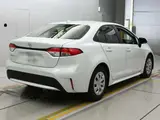 2025 Toyota Corolla X White Sedan for sale, Japanese used car export - photo 2 of 12 | GULJI TRADERS