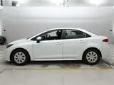 2025 Toyota Corolla X White Sedan for sale, Japanese used car export - photo 4 of 12 | GULJI TRADERS