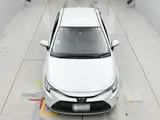 2025 Toyota Corolla X White Sedan for sale, Japanese used car export - photo 7 of 12 | GULJI TRADERS