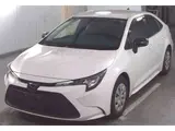 2025 Toyota Corolla Hybrid X (late model) White Sedan for sale, Japanese used car export - photo 3 of 9 | GULJI TRADERS