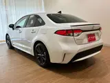 2026 Toyota Corolla 1.8 Hybrid WxB Registered, Unused Vehicle Pearl Sedan for sale, Japanese used car export - photo 20 of 64 | GULJI TRADERS