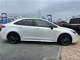 2026 Toyota Corolla 1.8 Hybrid WXB with rearview camera, ETC 2.0, and genuine front and rear dashcams. White Sedan for sale, Japanese used car export - photo 4 of 47 | GULJI TRADERS
