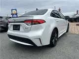 2026 Toyota Corolla 1.8 Hybrid WXB with rearview camera, ETC 2.0, and genuine front and rear dashcams. White Sedan for sale, Japanese used car export - photo 5 of 47 | GULJI TRADERS