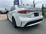 2026 Toyota Corolla 1.8 Hybrid WXB with rearview camera, ETC 2.0, and genuine front and rear dashcams. White Sedan for sale, Japanese used car export - photo 7 of 47 | GULJI TRADERS