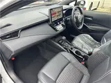 2026 Toyota Corolla 1.8 Hybrid WXB with rearview camera, ETC 2.0, and genuine front and rear dashcams. White Sedan for sale, Japanese used car export - photo 39 of 47 | GULJI TRADERS