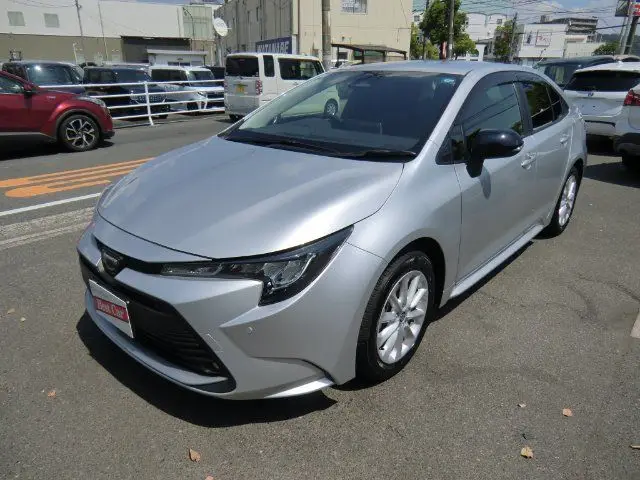 2026 Toyota Corolla Hybrid G Silver Sedan for sale, Japanese used car export - photo 1 of 3 | GULJI TRADERS
