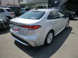 2026 Toyota Corolla Hybrid G Silver Sedan for sale, Japanese used car export - photo 2 of 3 | GULJI TRADERS