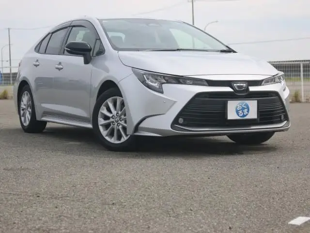 2026 Toyota Corolla Hybrid G Safety Sense - photo 1 2026 Toyota Corolla Hybrid G Safety Sense Silver Sedan for sale, Japanese used car export - photo 1 of 9 | GULJI TRADERS