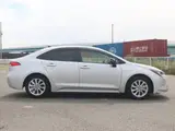2026 Toyota Corolla Hybrid G ​​Safety Sense Silver Sedan for sale, Japanese used car export - photo 4 of 9 | GULJI TRADERS