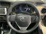 2014 Toyota Corolla Axio hybrid Silver Sedan for sale, Japanese used car export - photo 23 of 64 | GULJI TRADERS