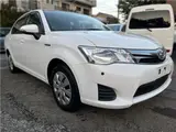 2015 Toyota Corolla Axio Hybrid HV White Sedan for sale, Japanese used car export - photo 1 of 55 | GULJI TRADERS