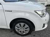 2015 Toyota Corolla Axio Hybrid HV White Sedan for sale, Japanese used car export - photo 9 of 55 | GULJI TRADERS