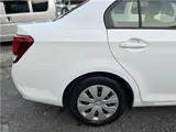 2015 Toyota Corolla Axio Hybrid HV White Sedan for sale, Japanese used car export - photo 12 of 55 | GULJI TRADERS