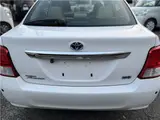2015 Toyota Corolla Axio Hybrid HV White Sedan for sale, Japanese used car export - photo 16 of 55 | GULJI TRADERS