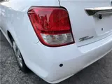 2015 Toyota Corolla Axio Hybrid HV White Sedan for sale, Japanese used car export - photo 19 of 55 | GULJI TRADERS