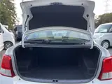 2015 Toyota Corolla Axio Hybrid HV White Sedan for sale, Japanese used car export - photo 40 of 55 | GULJI TRADERS