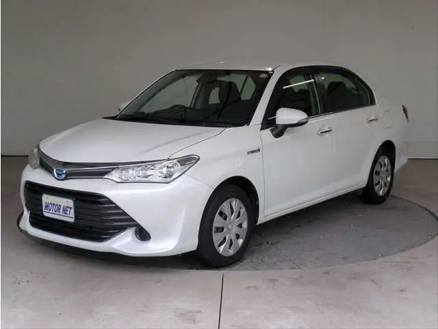 2015 Toyota Corolla Axio 1.5 Hybrid G Pearl Sedan for sale, Japanese used car export - photo 1 of 43 | GULJI TRADERS