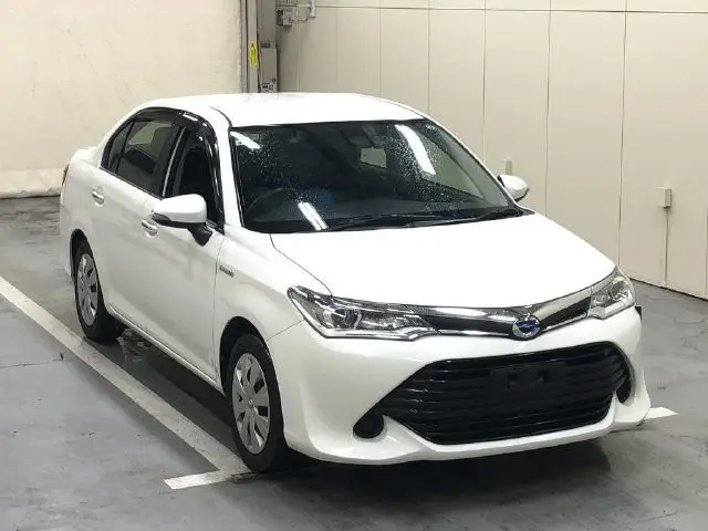 2015 Toyota Corolla Axio Hybrid G White Sedan for sale, Japanese used car export - photo 1 of 6 | GULJI TRADERS