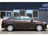 2016 Toyota Corolla Axio hybrid Brown Sedan for sale, Japanese used car export - photo 13 of 53 | GULJI TRADERS