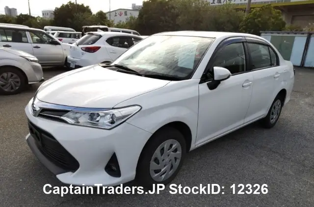 2018 Toyota Corolla Axio - photo 1 2018 Toyota Corolla Axio White Sedan for sale, Japanese used car export | GULJI TRADERS