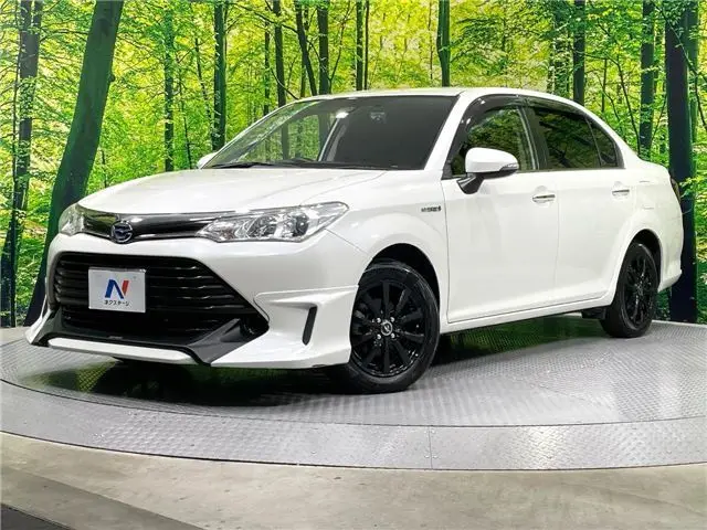 2018 Toyota Corolla Axio Hybrid G Pearl Sedan for sale, Japanese used car export - photo 1 of 30 | GULJI TRADERS