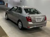 2018 Toyota Corolla Axio 1.5X Brown Sedan for sale, Japanese used car export - photo 3 of 3 | GULJI TRADERS