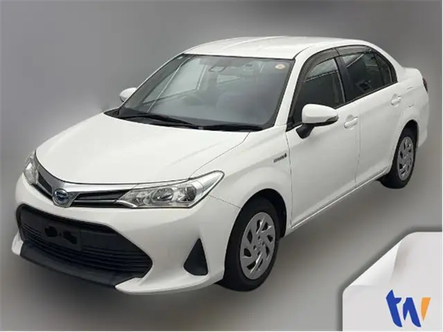 2019 Toyota Corolla Axio hybrid - photo 1 2019 Toyota Corolla Axio hybrid White Sedan for sale, Japanese used car export - photo 1 of 8 | GULJI TRADERS