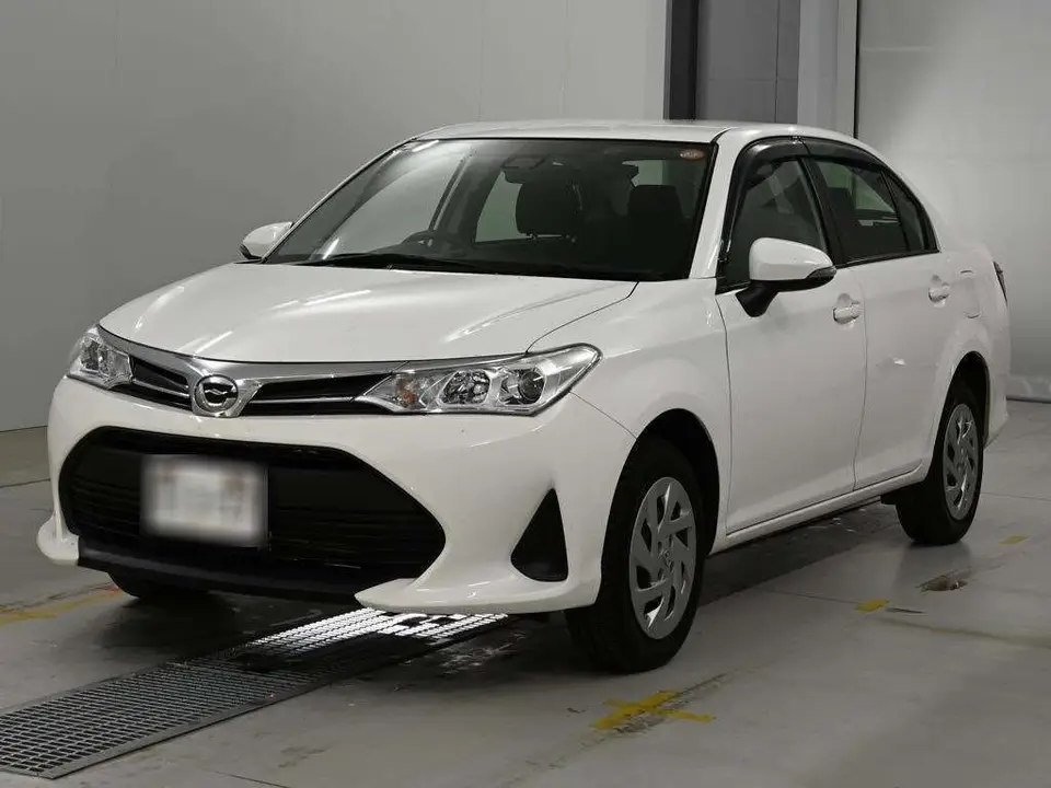 2019 Toyota Corolla Axio 1.5X 4WD White Sedan for sale, Japanese used car export - photo 1 of 12 | GULJI TRADERS
