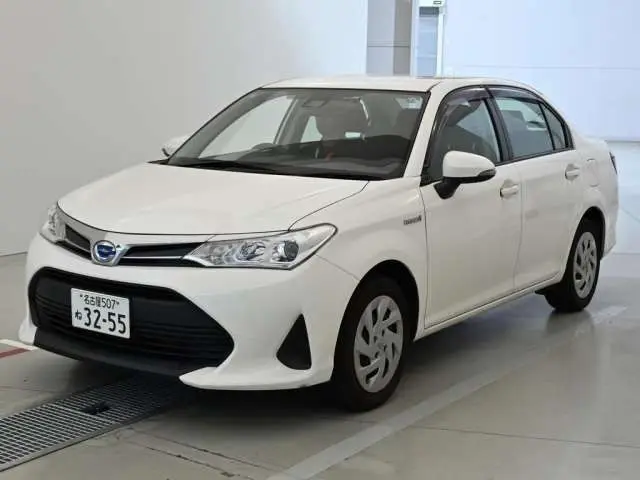 2019 Toyota Corolla Axio hybrid White Sedan for sale, Japanese used car export - photo 1 of 12 | GULJI TRADERS