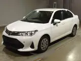 2019 Toyota Corolla Axio 1.5X White Sedan for sale, Japanese used car export - photo 1 of 11 | GULJI TRADERS