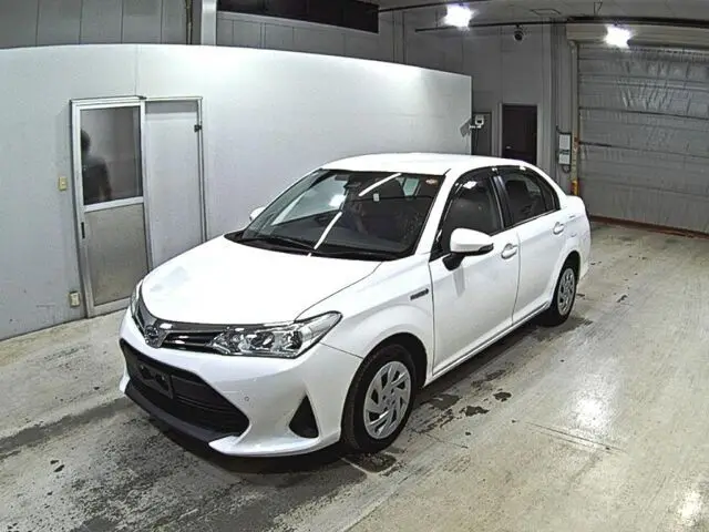 2020 Toyota Corolla Axio Hybrid EX White Sedan for sale, Japanese used car export | GULJI TRADERS