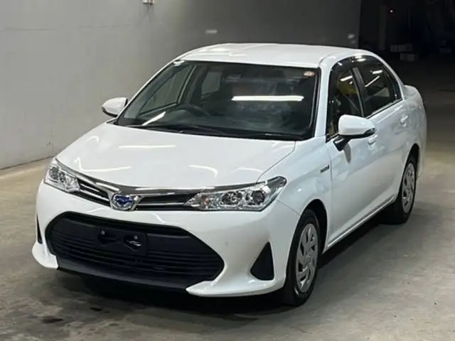 2020 Toyota Corolla Axio Hybrid EX - photo 1 2020 Toyota Corolla Axio Hybrid EX White Sedan for sale, Japanese used car export - photo 1 of 3 | GULJI TRADERS