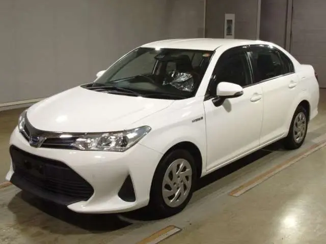 2020 Toyota Corolla Axio Hybrid EX White Sedan for sale, Japanese used car export - photo 1 of 11 | GULJI TRADERS
