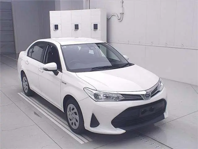 2020 Toyota Corolla Axio Hybrid EX - photo 1 2020 Toyota Corolla Axio Hybrid EX White Sedan for sale, Japanese used car export - photo 1 of 11 | GULJI TRADERS
