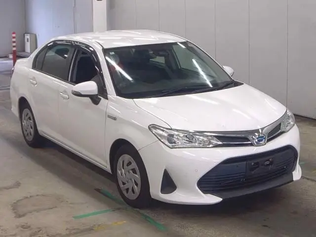 2020 Toyota Corolla Axio Hybrid EX - photo 1 2020 Toyota Corolla Axio Hybrid EX White Sedan for sale, Japanese used car export - photo 1 of 5 | GULJI TRADERS
