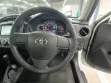 2021 Toyota Corolla Axio EX 4WD White Sedan for sale, Japanese used car export - photo 9 of 12 | GULJI TRADERS