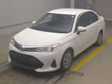 2021 Toyota Corolla Axio Hybrid EX White Sedan for sale, Japanese used car export - photo 1 of 7 | GULJI TRADERS