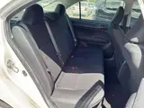 2021 Toyota Corolla Axio Hybrid EX White Sedan for sale, Japanese used car export - photo 7 of 7 | GULJI TRADERS
