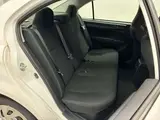 2021 Toyota Corolla Axio Hybrid EX White Sedan for sale, Japanese used car export - photo 11 of 12 | GULJI TRADERS