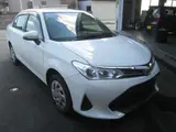 2021 Toyota Corolla Axio EX 4WD White Sedan for sale, Japanese used car export - photo 1 of 13 | GULJI TRADERS